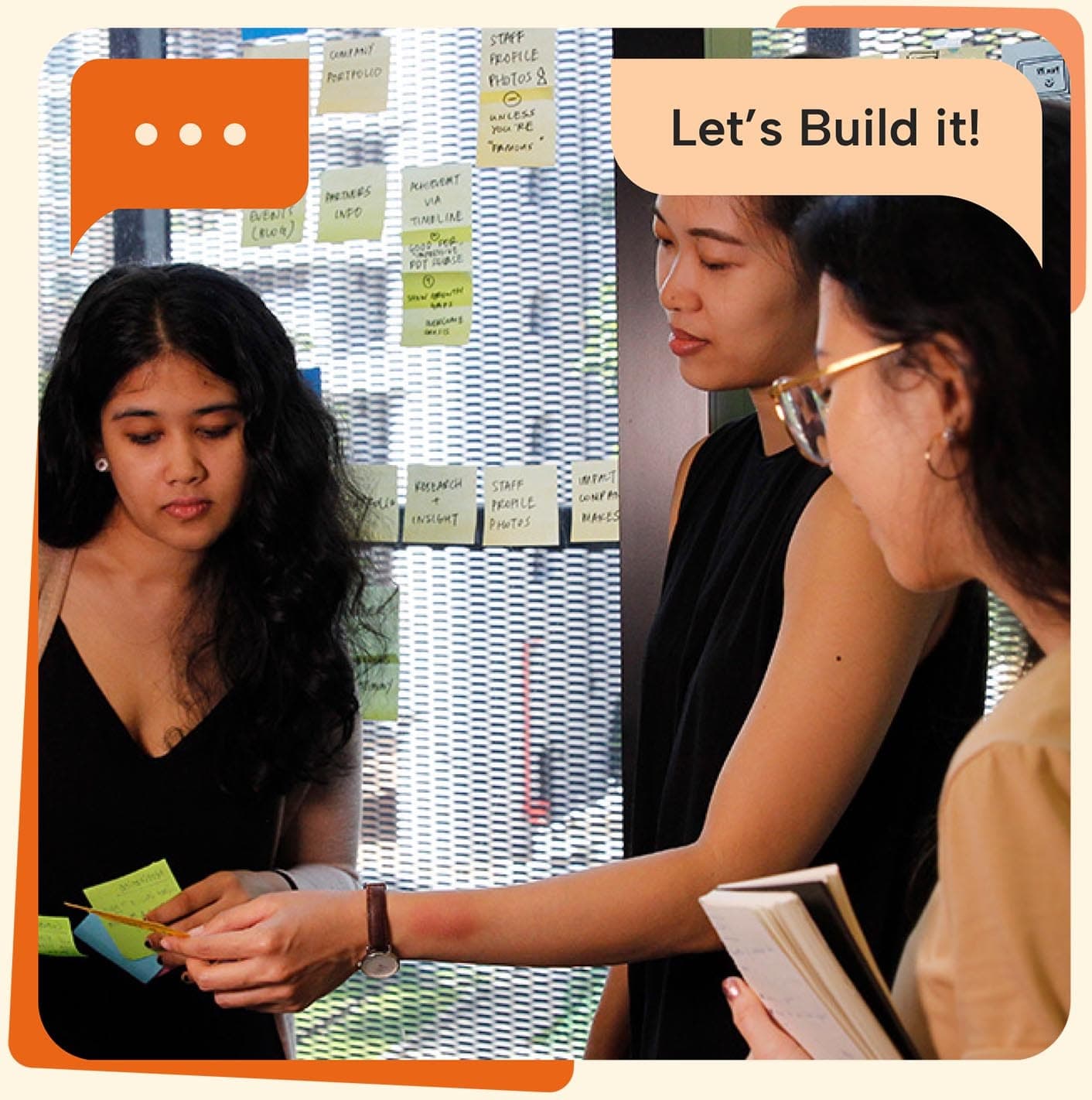 People collaborating with sticky notes during a brainstorming session