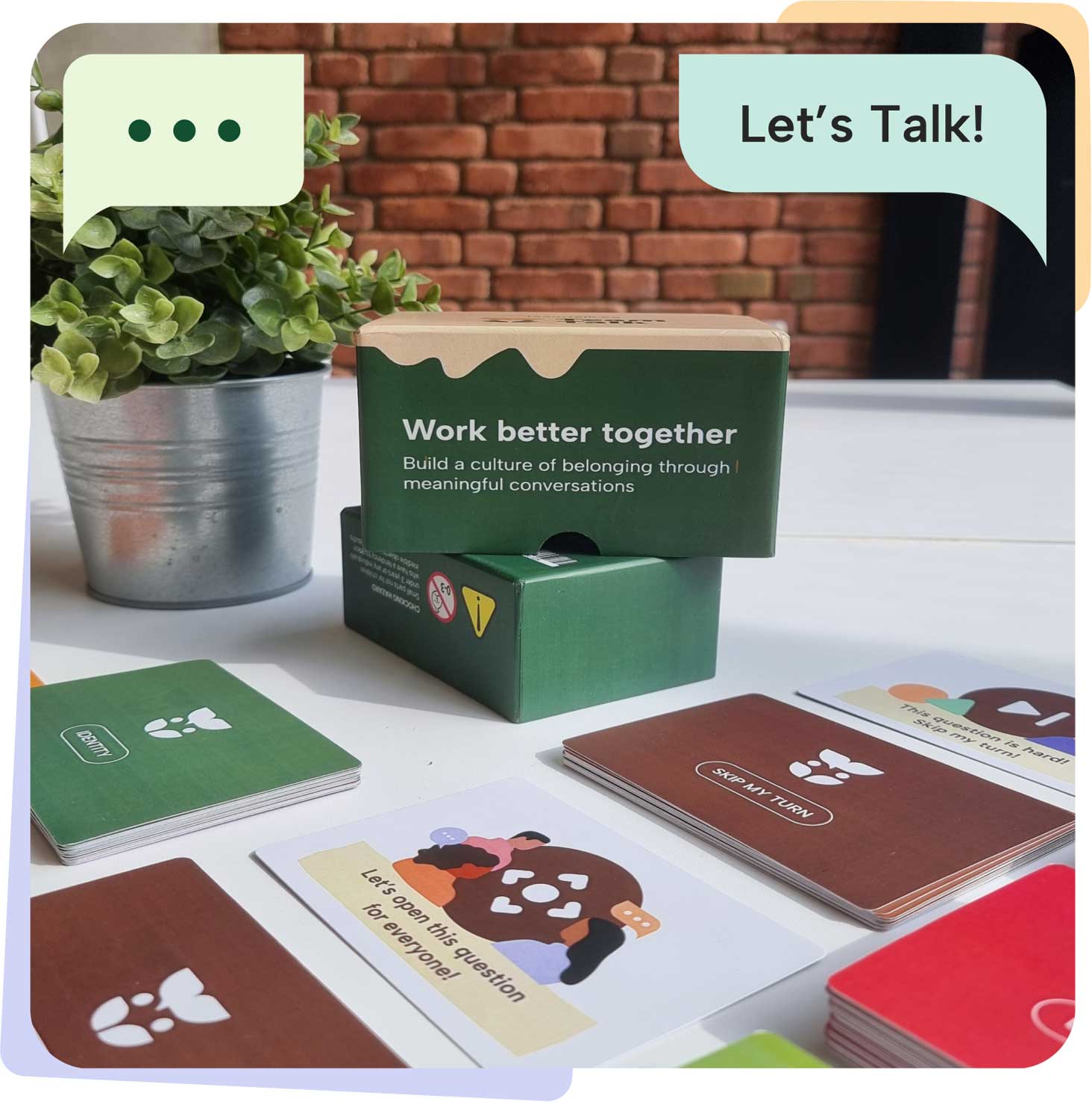 TeamTalk conversation deck placed on a table showcasing it's card types with a 'Let's talk' blurb