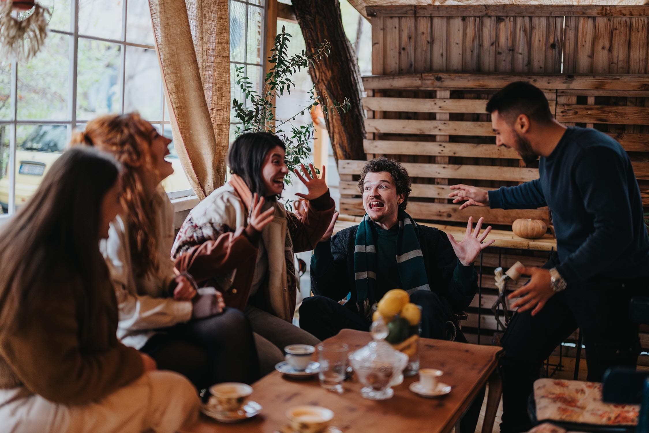 Group of people sitting together having an in-person conversation